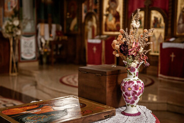 Christening ceremony. Orthodox Christening in the church. Christening details.
