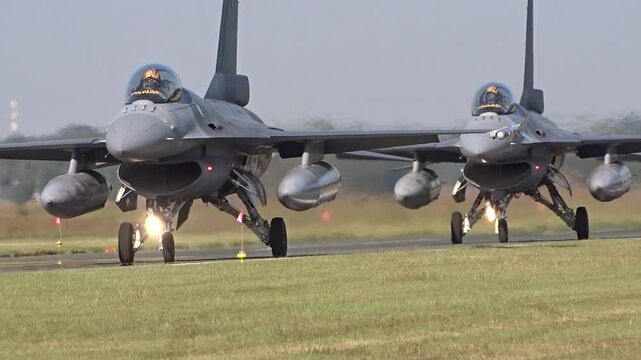 fighter jets seen taxiing to runway formation their for imminent combat operations capture essence military intricate dynamic air force ready war mission action heat haze 