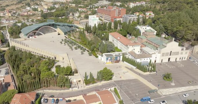 Aerial view of the Sanctuary of Saint Pio of Pietrelcina, also known as Padre Pio Pilgrimage Church, and the sanctuary of Santa Maria delle Grazie located in San Giovanni Rotondo, Puglia, Italy. 