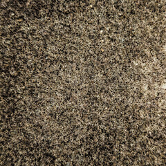 abstract detail texture of sandpaper stone concrete ground taupe neutral brown simple minimalist presentation versatile casual background
