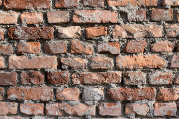 Rough uneven brick wall