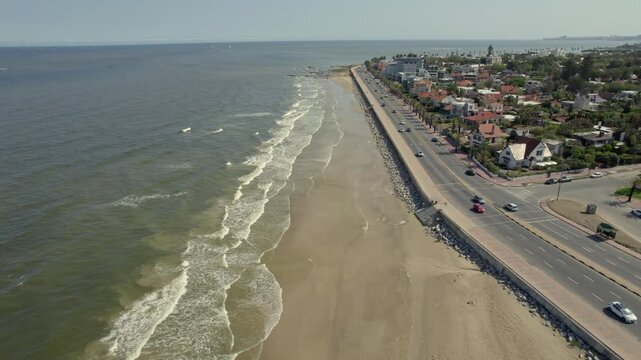 Drone footage over a shoreline highway in Montevideo