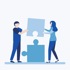 Two people are working together to solve a puzzle. The man is holding a piece of the puzzle, while the woman is holding another piece. Concept of teamwork and collaboration