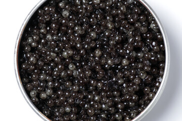 Black sturgeon caviar. Sturgeon caviar isolated on a white background in a jar. Top view