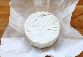 Vegan cheese. Coconut camembert. Dairy-free plant-based cheese analogue.
