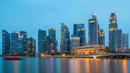 Fototapeta premium Stunning twilight view of Singapore city cityscape skyscrapers day to night timelapse