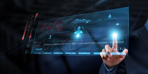 Aerospace: Businessman analyzes data strategy with graph on digital screen. Innovation, technology advancements, satellite systems, space exploration, aviation safety, aerospace engineering. © AD
