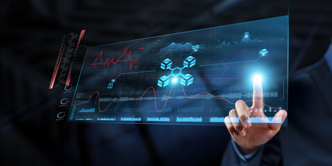 Blockchain Technology: Businessman analyzes data strategy with graph on digital screen....