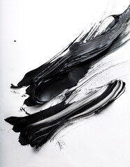 black ink paint strokes on white