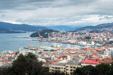 View over the city of Vigo in Galicia, Spain, with its port and container terminal in the center.