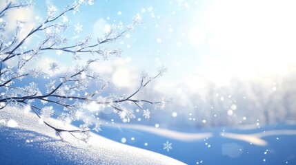 A beautiful blue sky with snowflakes falling, a branch covered in ice crystals