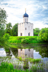 Church of Intercession upon Nerl River 12th century. (Bogolyubovo, Vladimir region, Golden Ring of Russia) A warm summer evening. historical and cultural heritage of Russia.