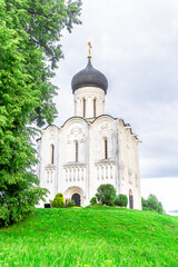 Church of Intercession upon Nerl River 12th century. (Bogolyubovo, Vladimir region, Golden Ring of Russia) A warm summer evening. historical and cultural heritage of Russia.