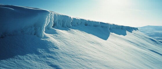 Obraz premium Pristine snow drifts create a stunning icy landscape, capturing the tranquility of winter's untouched beauty and serenity.