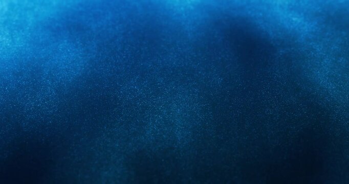 Deep blue background loop with shimmering particles reminiscent of digital data or cosmic dust. infinite cyberspace or a vast digital universe.