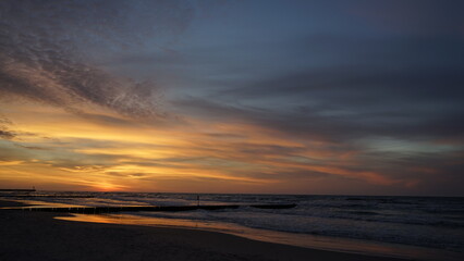 Sunset on the beach by the sea