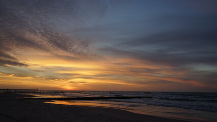 Sunset on the beach by the sea