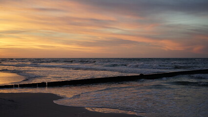 Sunset on the beach by the sea