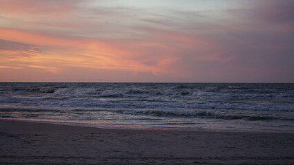 Sunset on the beach by the sea