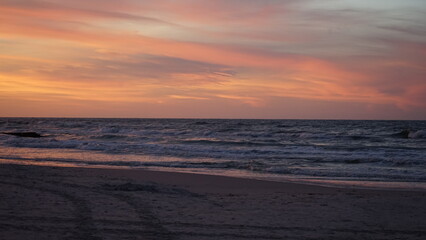 Sunset on the beach by the sea