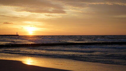 Sunset on the beach by the sea