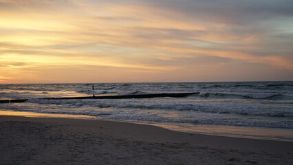 Sunset on the beach by the sea

