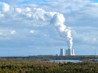Landscape of rising smoke from the Lippendorf Power Station's cooling towers, located near Leipzig....