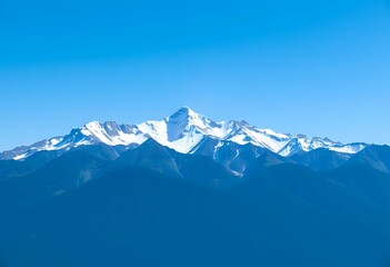 Obraz premium Majestic Mountain Range Under Clear Blue Sky - Minimalist Landscape for Adventure Activities