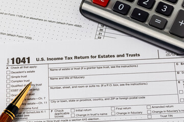 Estate and trust tax return form. Estate taxes, trust taxes and estate planning concept.