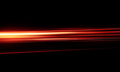 Red and orange light streaks move across a black background, resembling a light trail from a fast-moving object