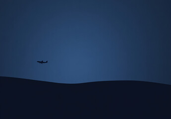 Fototapeta premium A single airplane flies across a blue twilight sky. The airplane is a silhouette against the light blue sky