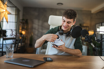 man technology blogger record video blog or v-log of home cctv camera