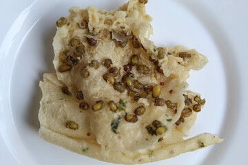 Traditional crackers with mung bean sprinkles from Indonesia, called Rempeyek Kacang Hijau