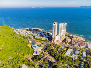 Modern architecture by the sea. 

A new neighborhood with unusual architecture VEGA city. Construction is underway. The surroundings of the resort city of Nha Trang in Vietnam.  Shooting from a drone.
