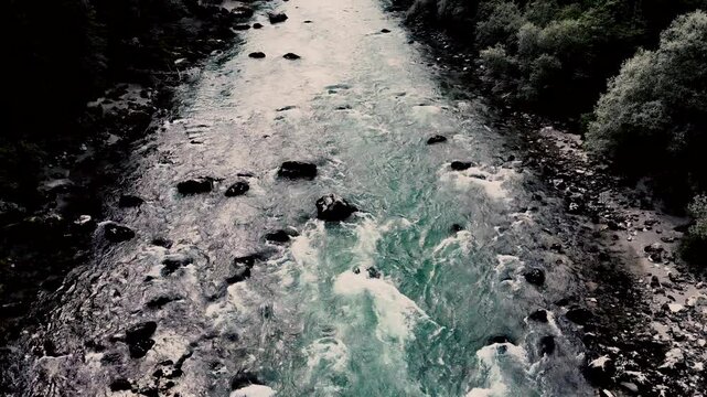 rone flight over river with strong current