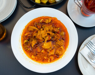 Traditional Spanish tripe dish Callos de ternera with tomato and paprika sauce