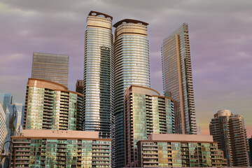 Toronto buildings exterior and sky view in Toronto, Ontario, Canada. Sunset in background.