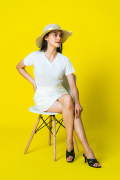 Woman in White V-Neck and Skirt Posing for Fashion Mockup