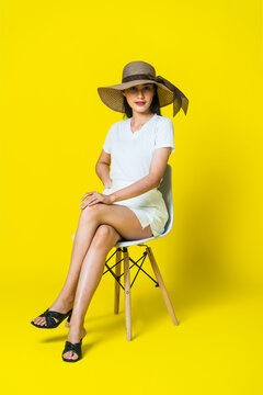 Casual White Outfit Sitting Pose of Western Woman for Fashion Mockup