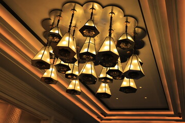antique hanging lamp with patterned walls