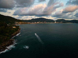 Aerial view sunset sky, Nature beautiful Light Sunset or sunrise over sea, Colorful dramatic majestic scenery Sky with Amazing clouds and waves in sunset sky purple light cloud background
