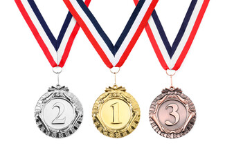 Gold, silver and bronze medals isolated on white