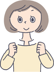 ガッツポーズをする女性