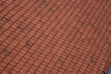 tile arrangement pattern on the roof of the house. tile pattern background. 