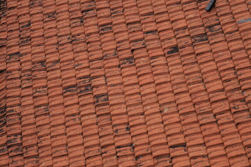 tile arrangement pattern on the roof of the house. tile pattern background. 