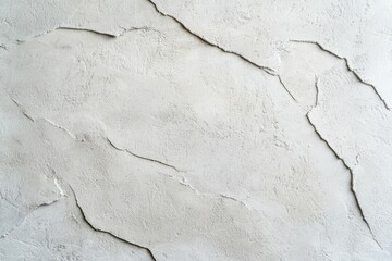 The wall is covered in cracks and has a rough texture