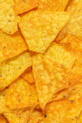 Yellow tortilla corn chips snacks background