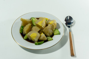 Pempek or mpek-mpek is a delicacy from Palembang, South Sumatra. It is made of fish and sago flours and served together with a dark, rich sauce called cuko.