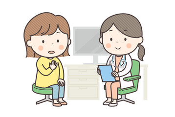 女性医師に症状を不安な様子で話す女性