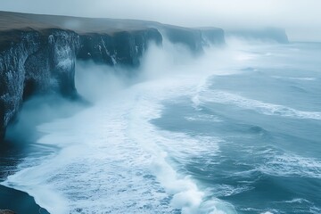 Powerful Waves Crashing Against Rocky Cliffs on a Stormy Day